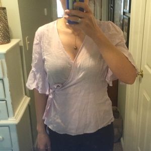 Lavender peplum wrap blouse with frilly sleeves